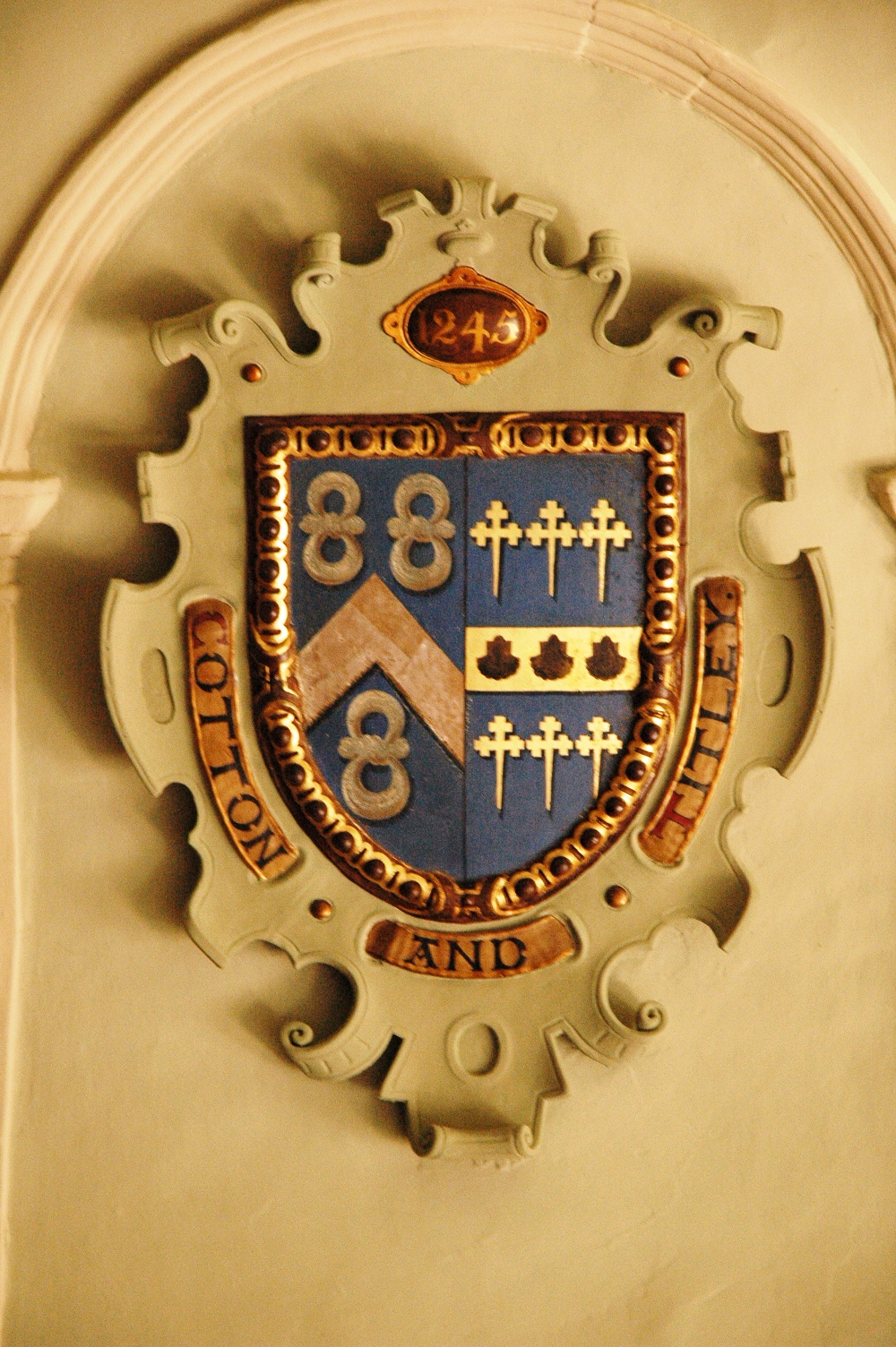 Joined arms of the Cotton and Titley families