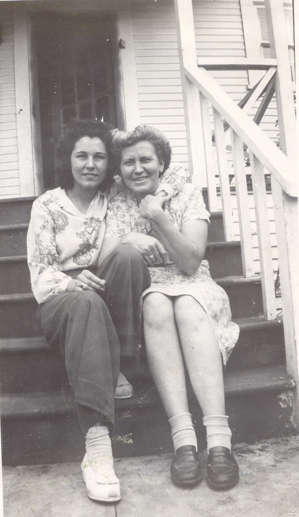 Florence Boyd and Katie Boyd sitting on steps together