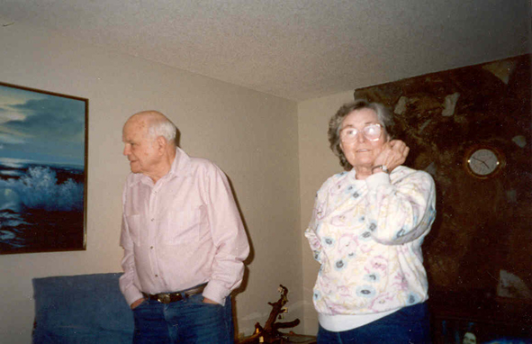 Frank and Florence standing in their living room