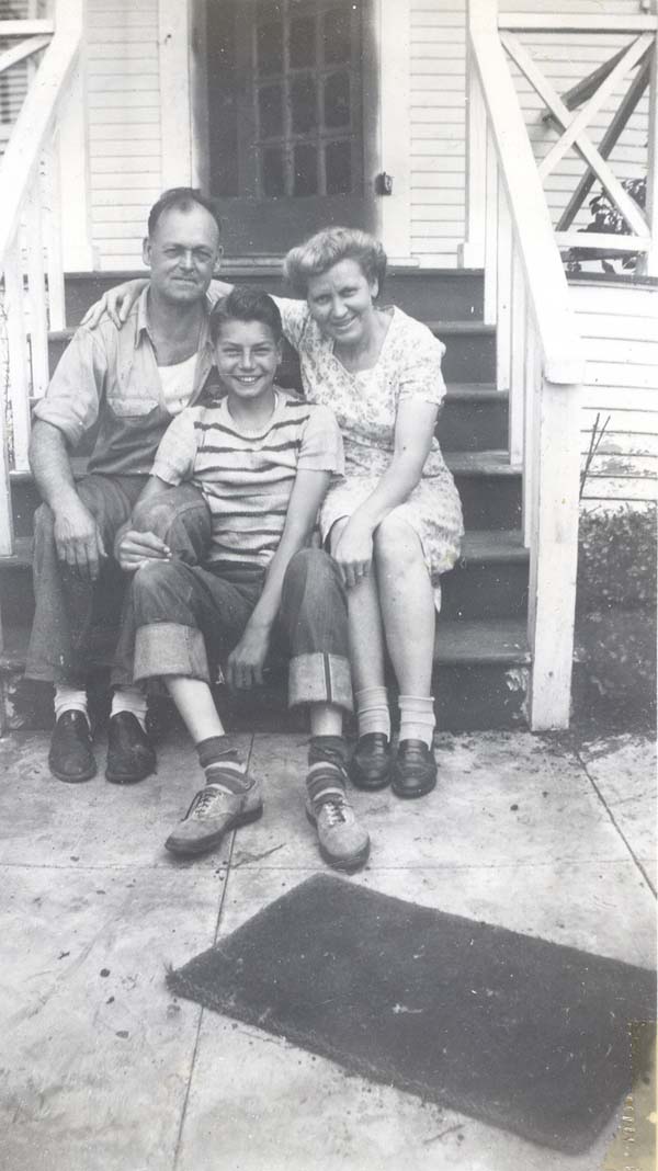 Frank, Wally, and Katie Willis sitting on steps