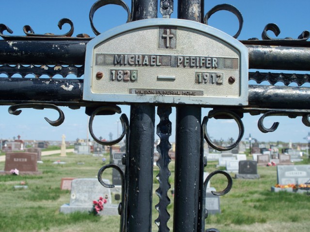 Closeup of plaque on grave marker of Michael Pfeifer