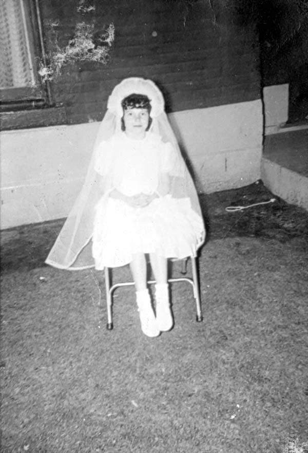 Janice, probably in first communion dress